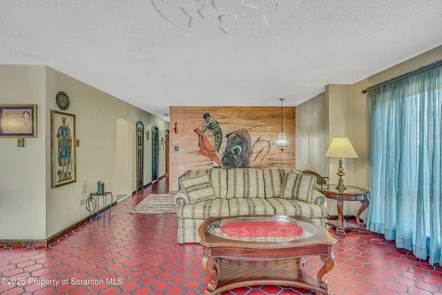 a bathroom with a sink a mirror and a shower