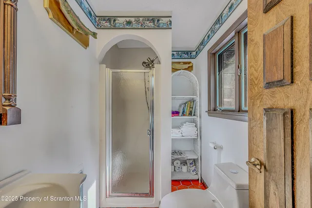 a view of a livingroom with furniture and window