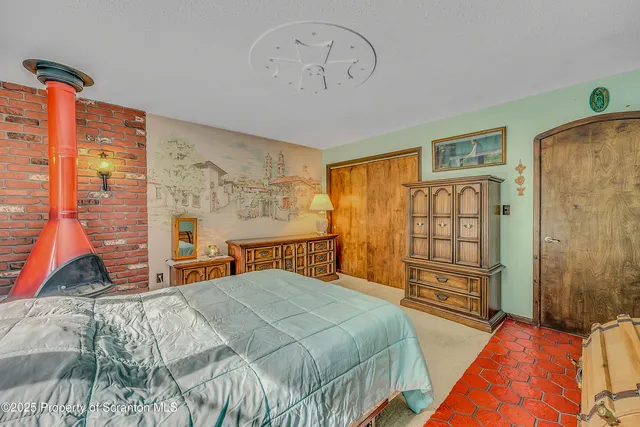 a front view of a fireplace with projector