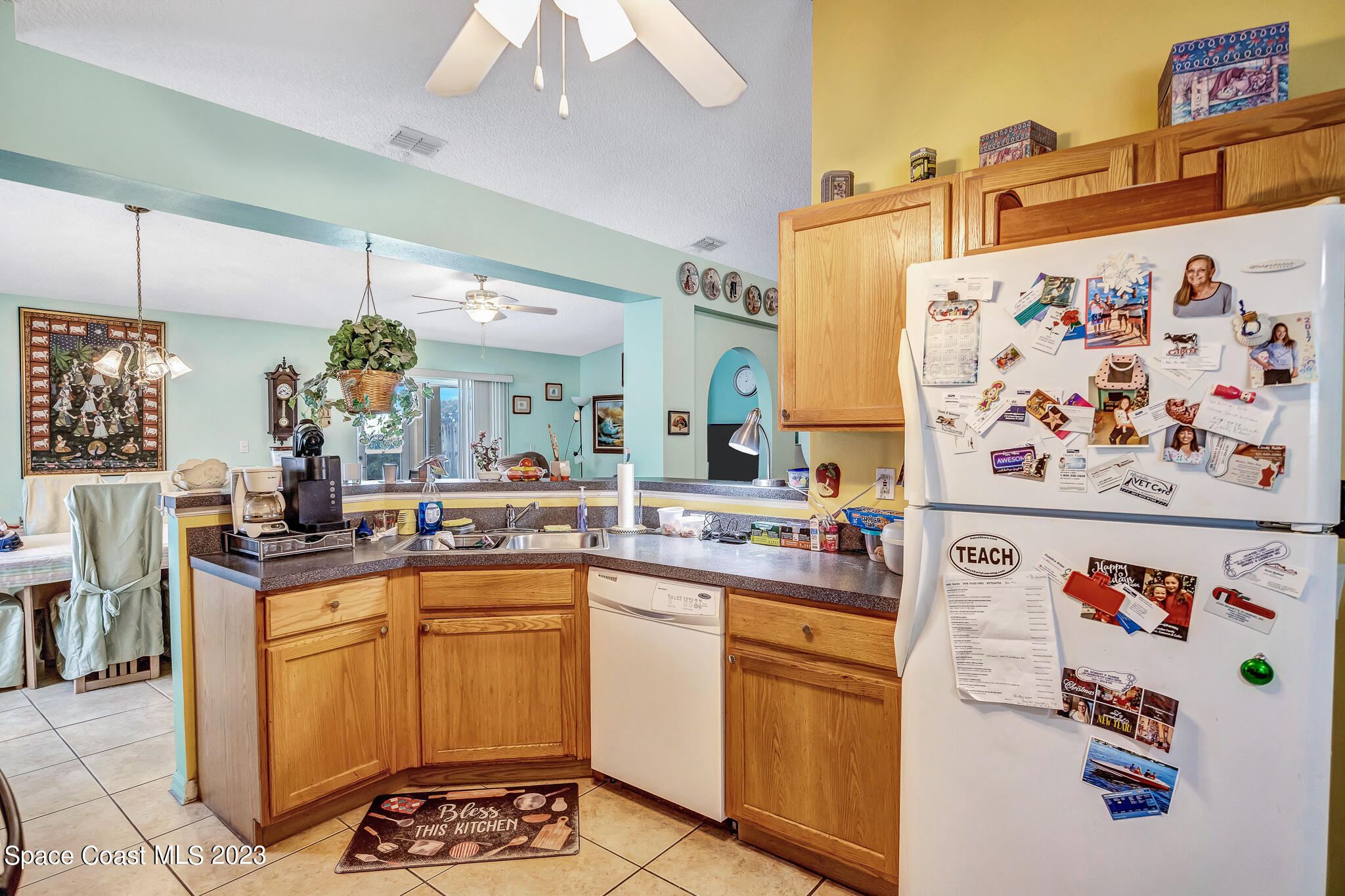 1149 White Oak Circle Melbourne, FL 32934 - Photo 27 of 55 a kitchen with a sink and cabinets
