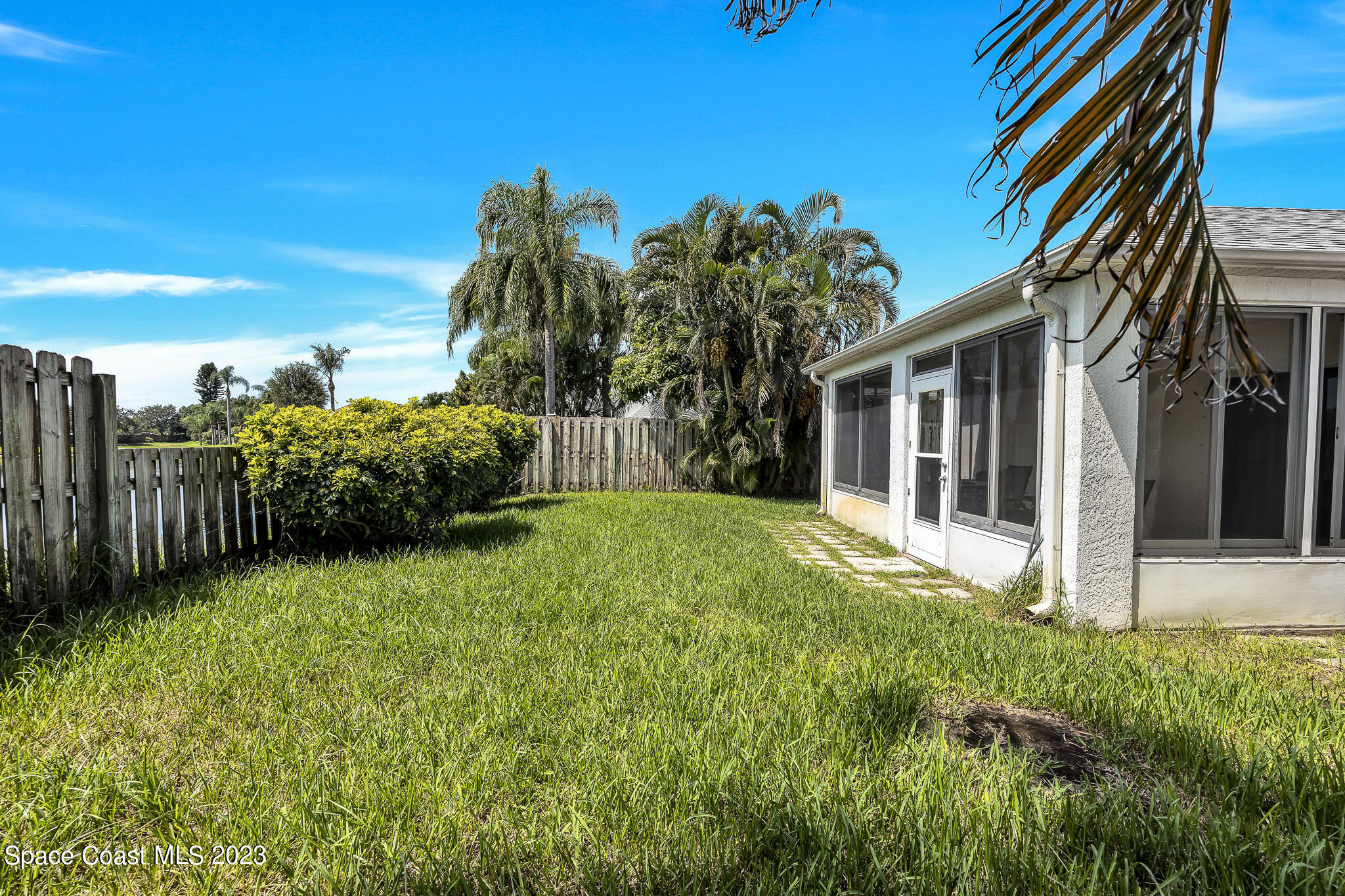 1149 White Oak Circle Melbourne, FL 32934 - Photo 34 of 55 a view of a house with backyard and garden