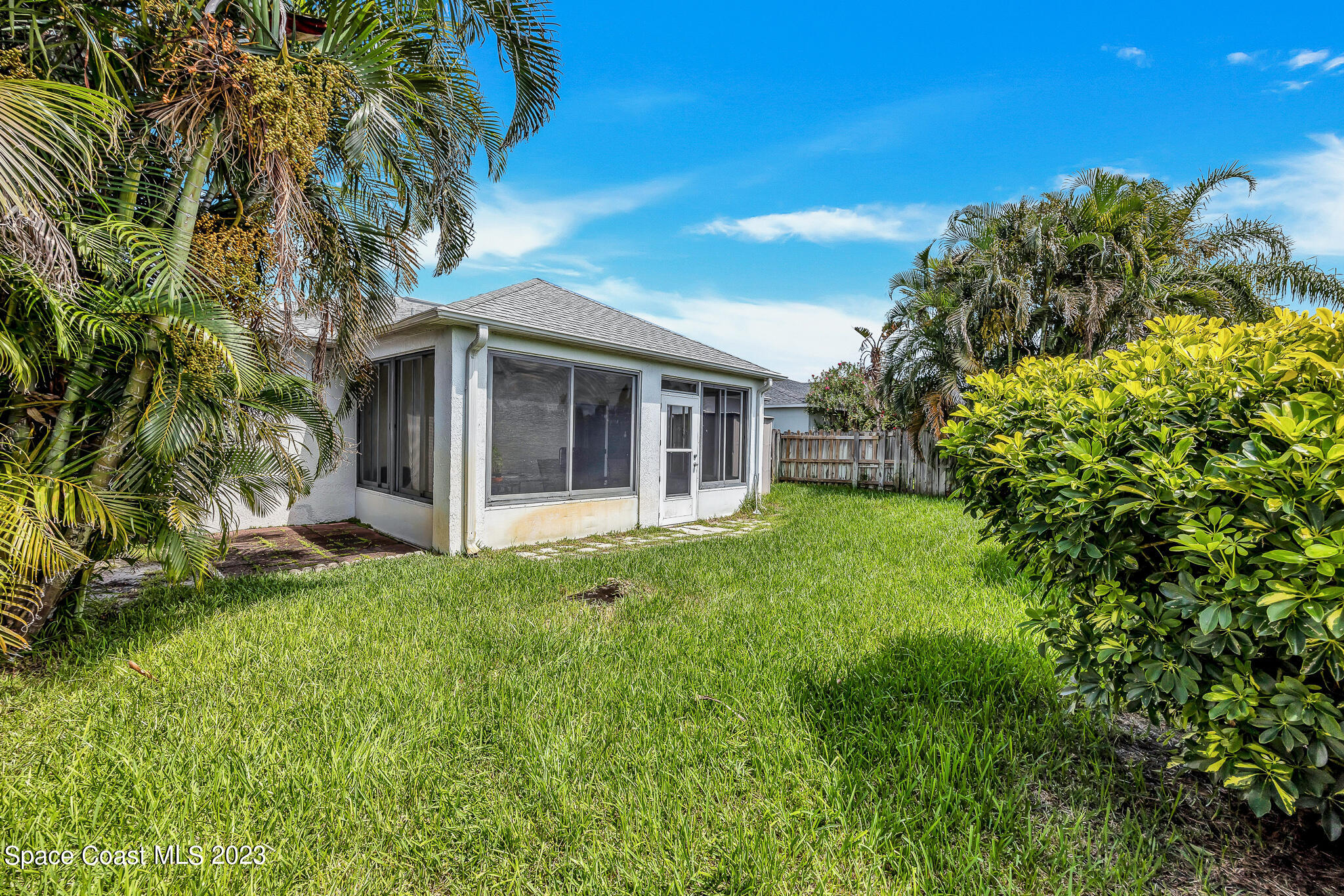 1149 White Oak Circle Melbourne, FL 32934 - Photo 35 of 55 a view of a house with a backyard