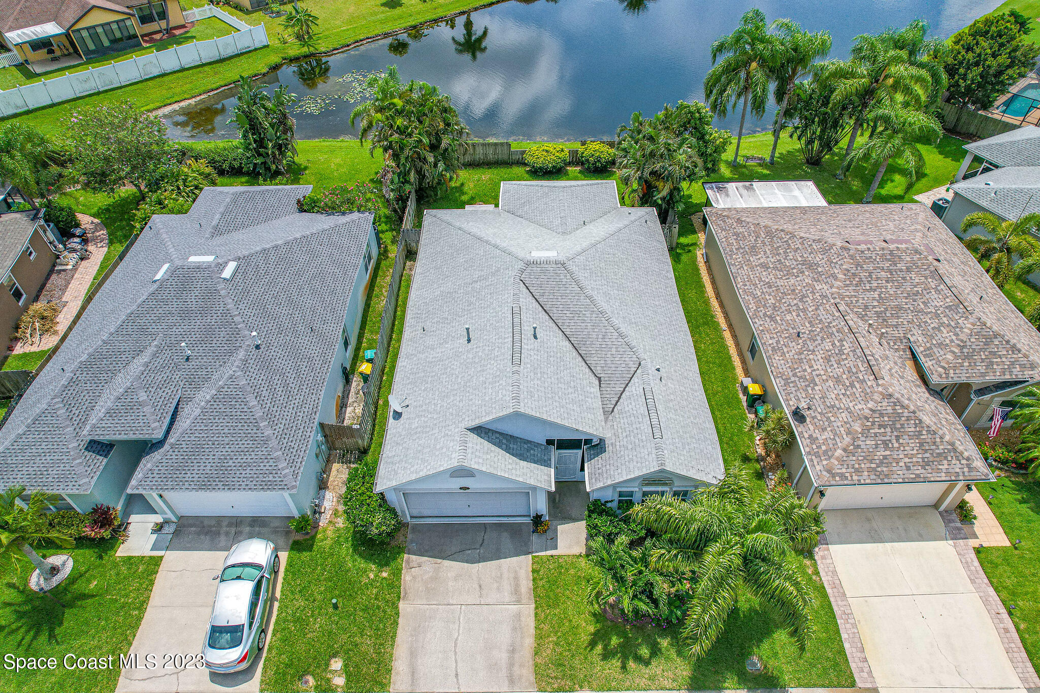 1149 White Oak Circle Melbourne, FL 32934 - Photo 41 of 55 an aerial view of a house with a yard