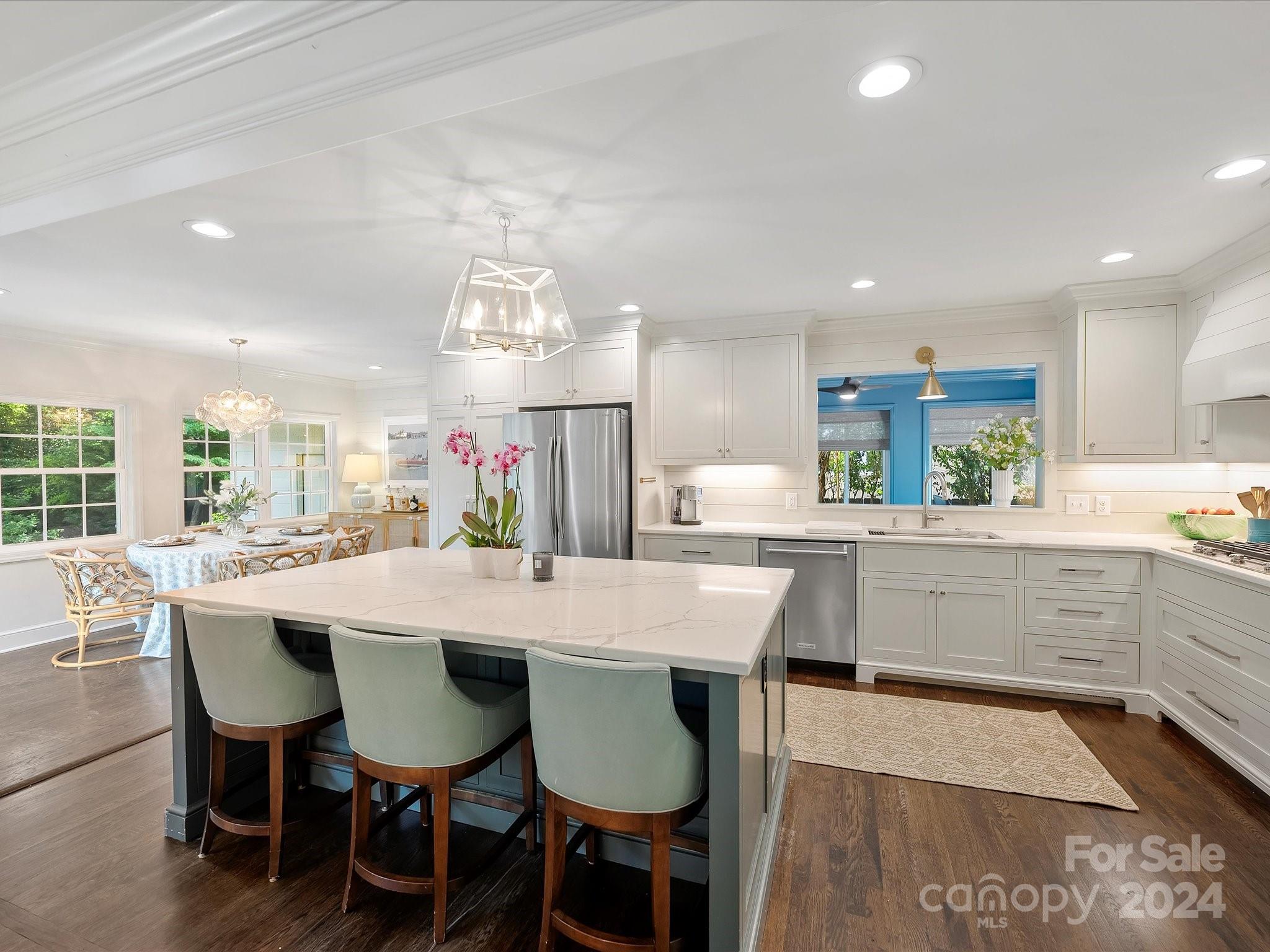 3401 Eastburn Road Charlotte, NC 28210 - Photo 12 of 43 a large kitchen with a table and chairs