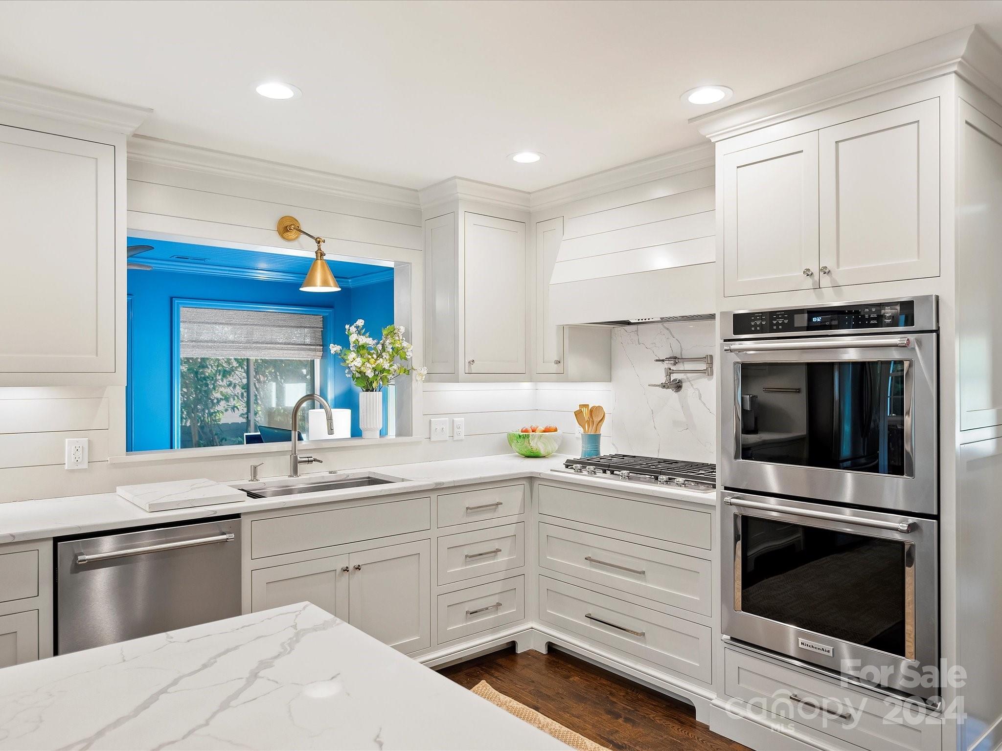 3401 Eastburn Road Charlotte, NC 28210 - Photo 17 of 43 a kitchen with a stove oven and sink