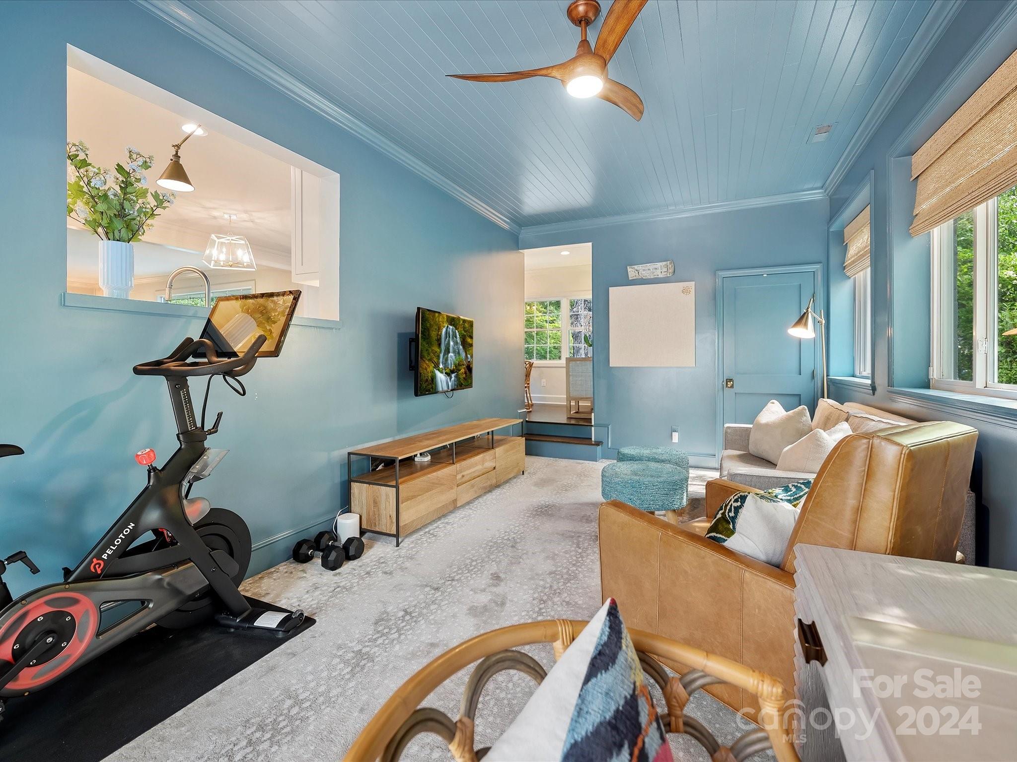 3401 Eastburn Road Charlotte, NC 28210 - Photo 25 of 43 a bedroom with furniture and a gym equipment