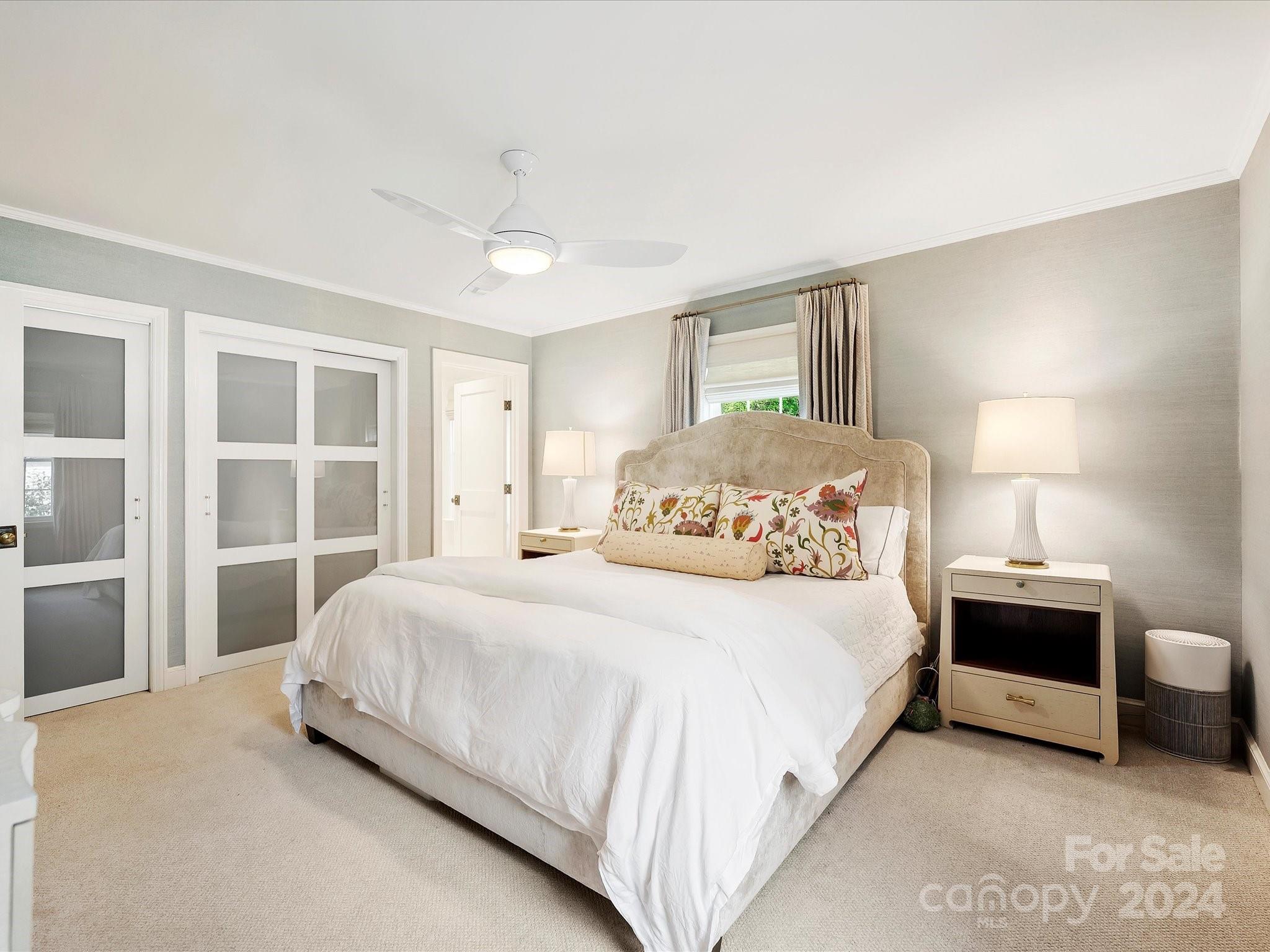 3401 Eastburn Road Charlotte, NC 28210 - Photo 29 of 43 a bedroom with bed and a large window