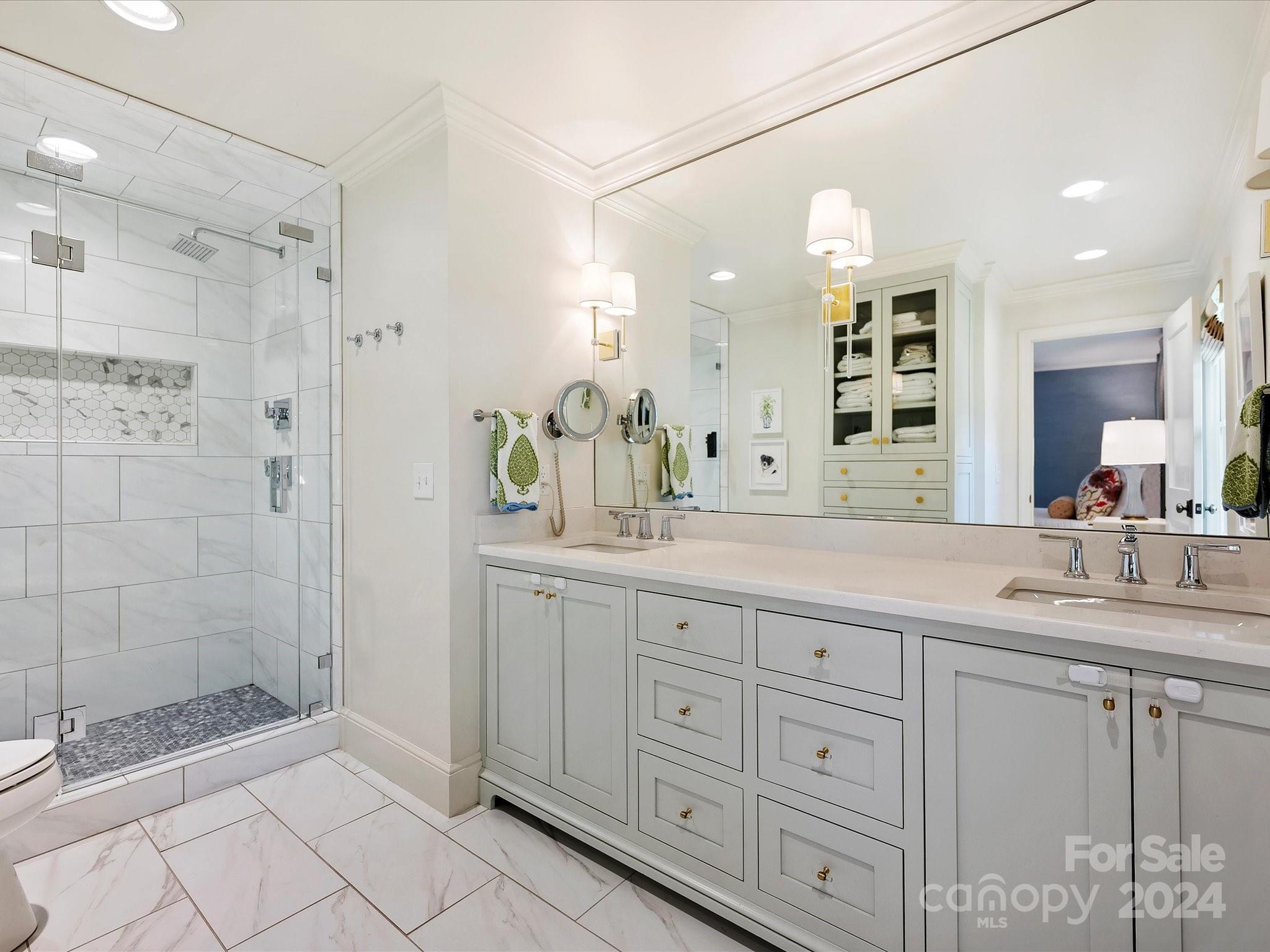 3401 Eastburn Road Charlotte, NC 28210 - Photo 30 of 43 a bathroom with a granite countertop sink mirror and shower