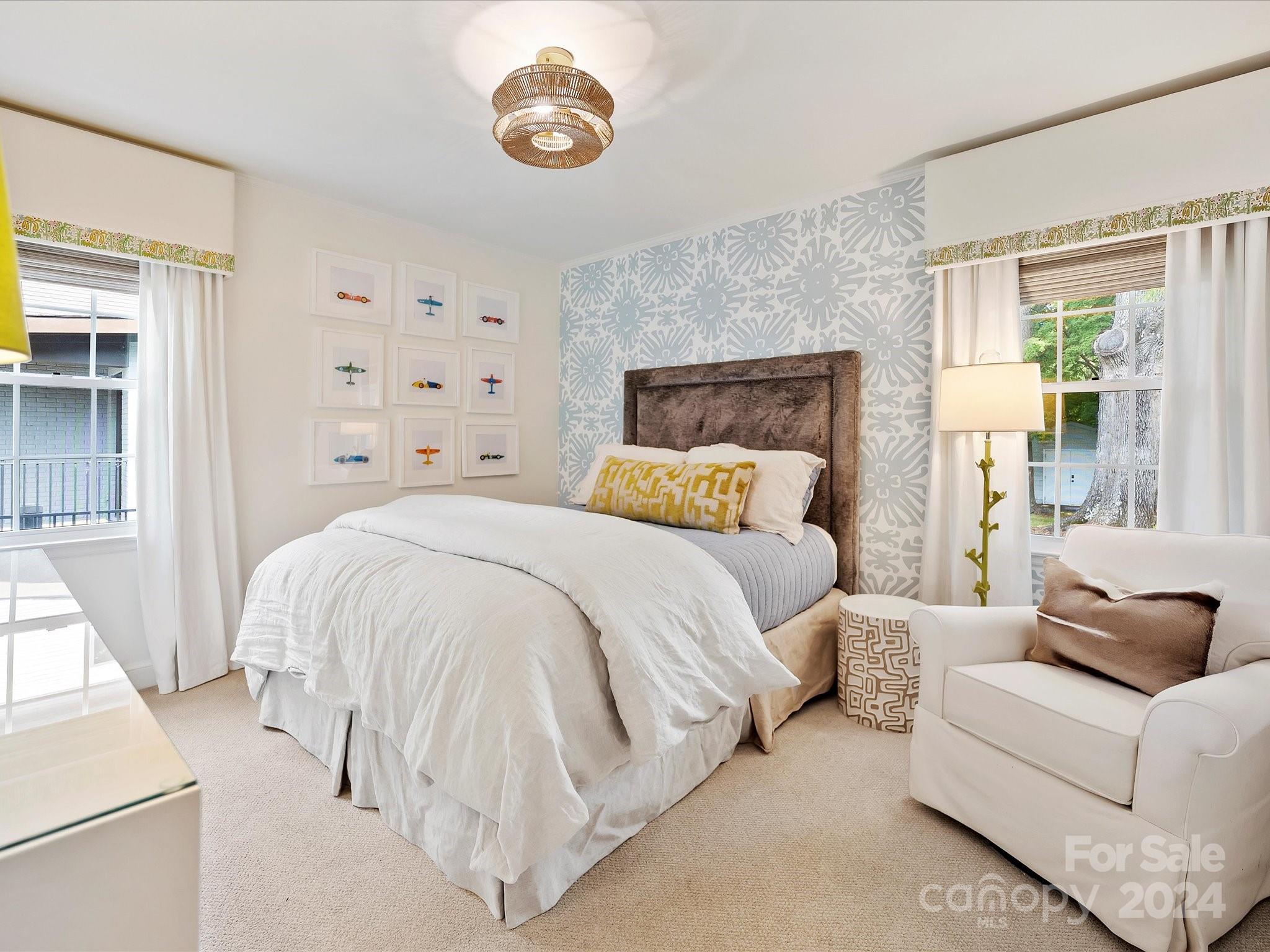3401 Eastburn Road Charlotte, NC 28210 - Photo 32 of 43 a spacious bedroom with a bed and a window