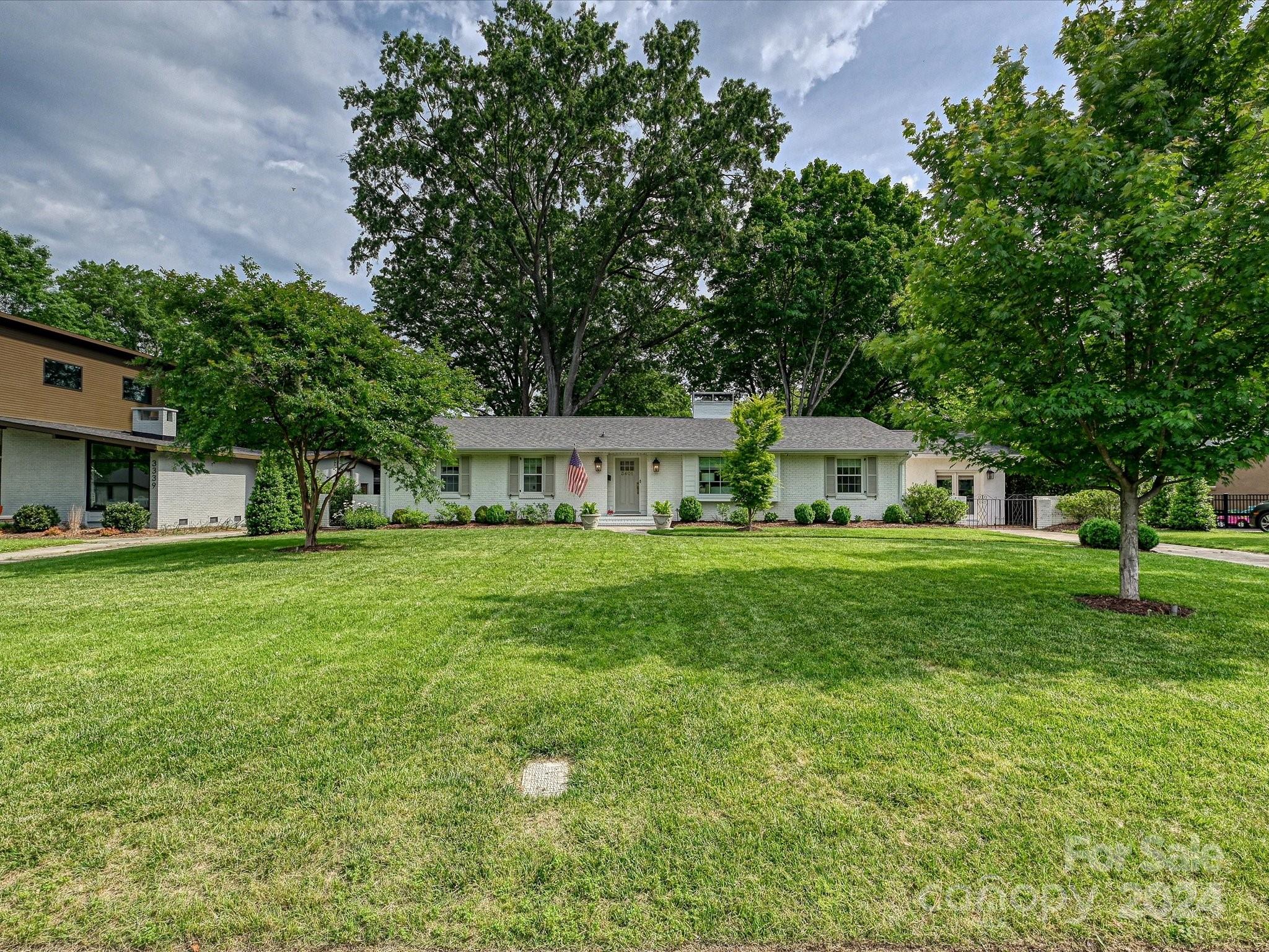 3401 Eastburn Road Charlotte, NC 28210 - Photo 43 of 43 a front view of a house with a garden