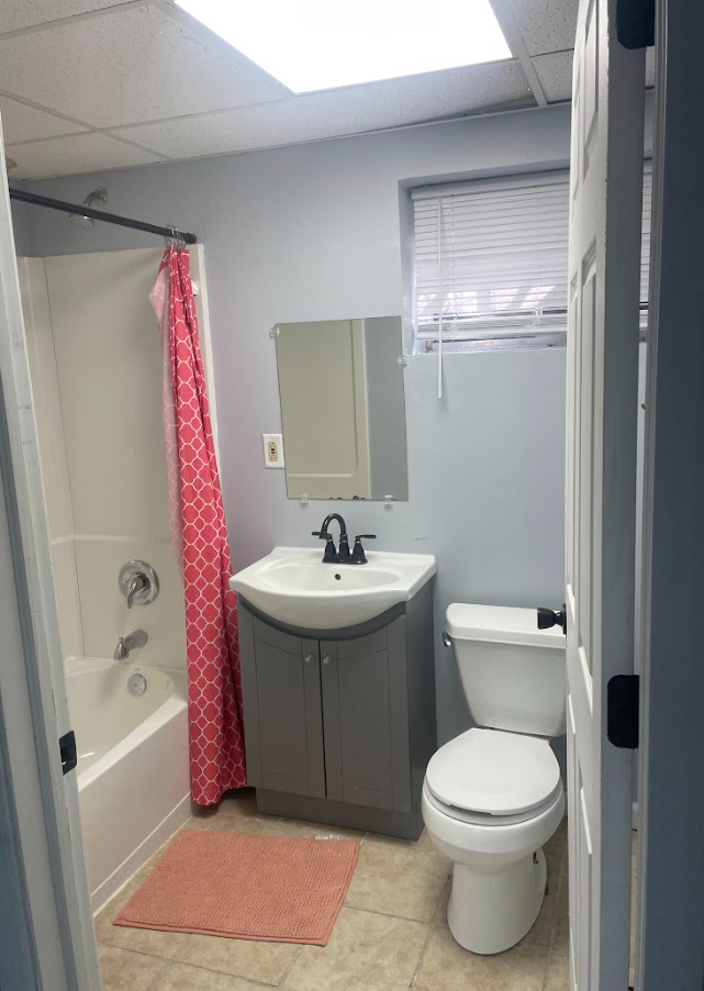 1221 Springdale Circle Naperville, IL 60564 - Photo 12 of 13 a bathroom with a sink toilet and shower