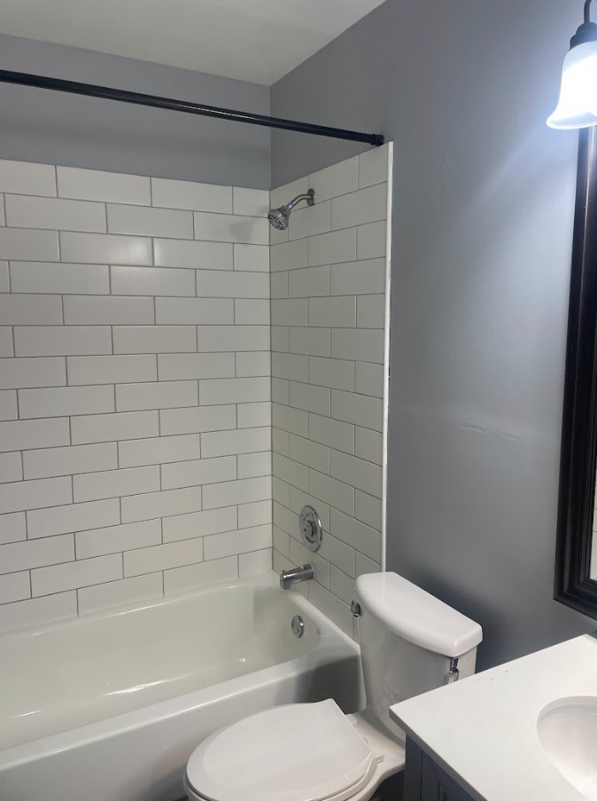 1221 Springdale Circle Naperville, IL 60564 - Photo 13 of 13 a bathroom with a toilet and a bathtub