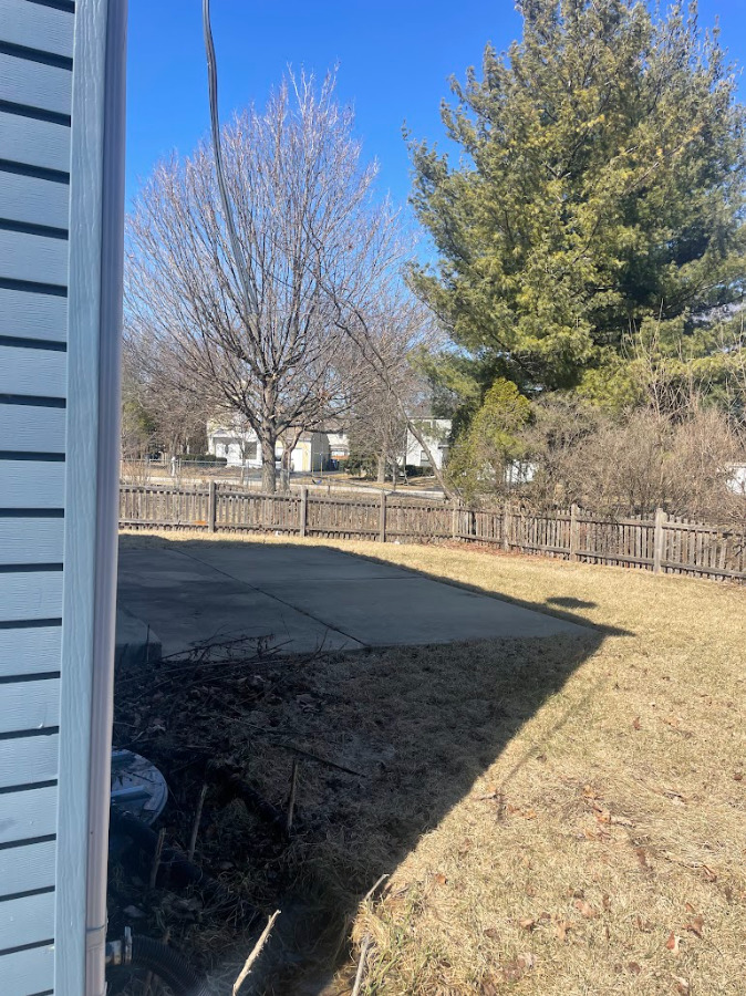 1221 Springdale Circle Naperville, IL 60564 - Photo 3 of 13 a view of a yard with wooden fence
