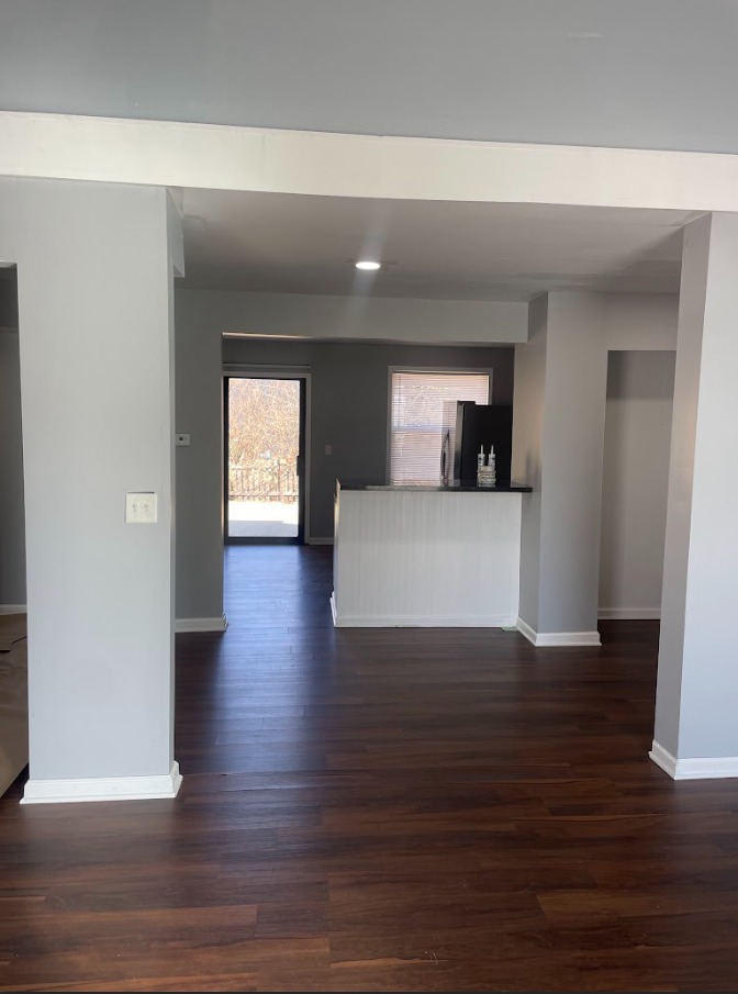 1221 Springdale Circle Naperville, IL 60564 - Photo 4 of 13 a view of a kitchen cabinets and wooden floor