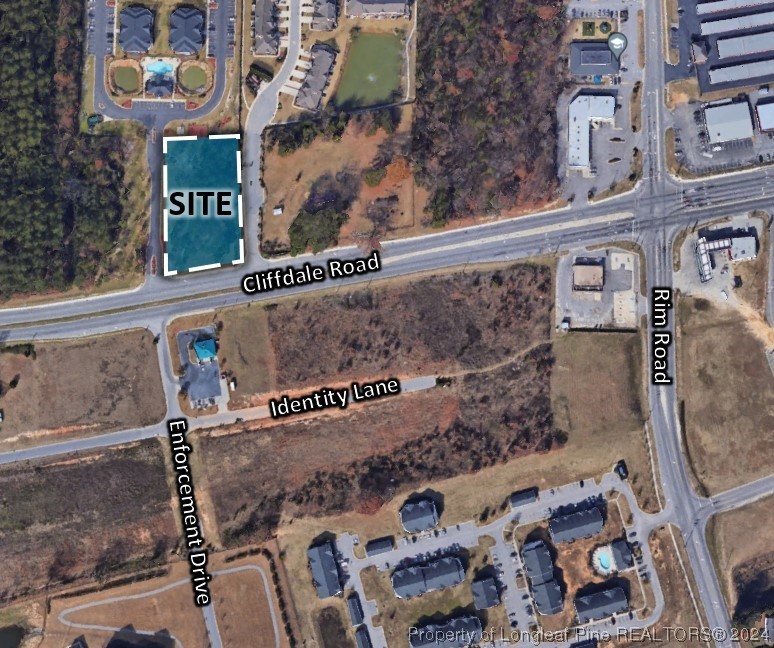 8306 Cliffdale Road Fayetteville, NC 28314 - Photo 1 of 1 a street sign on a pole on a street