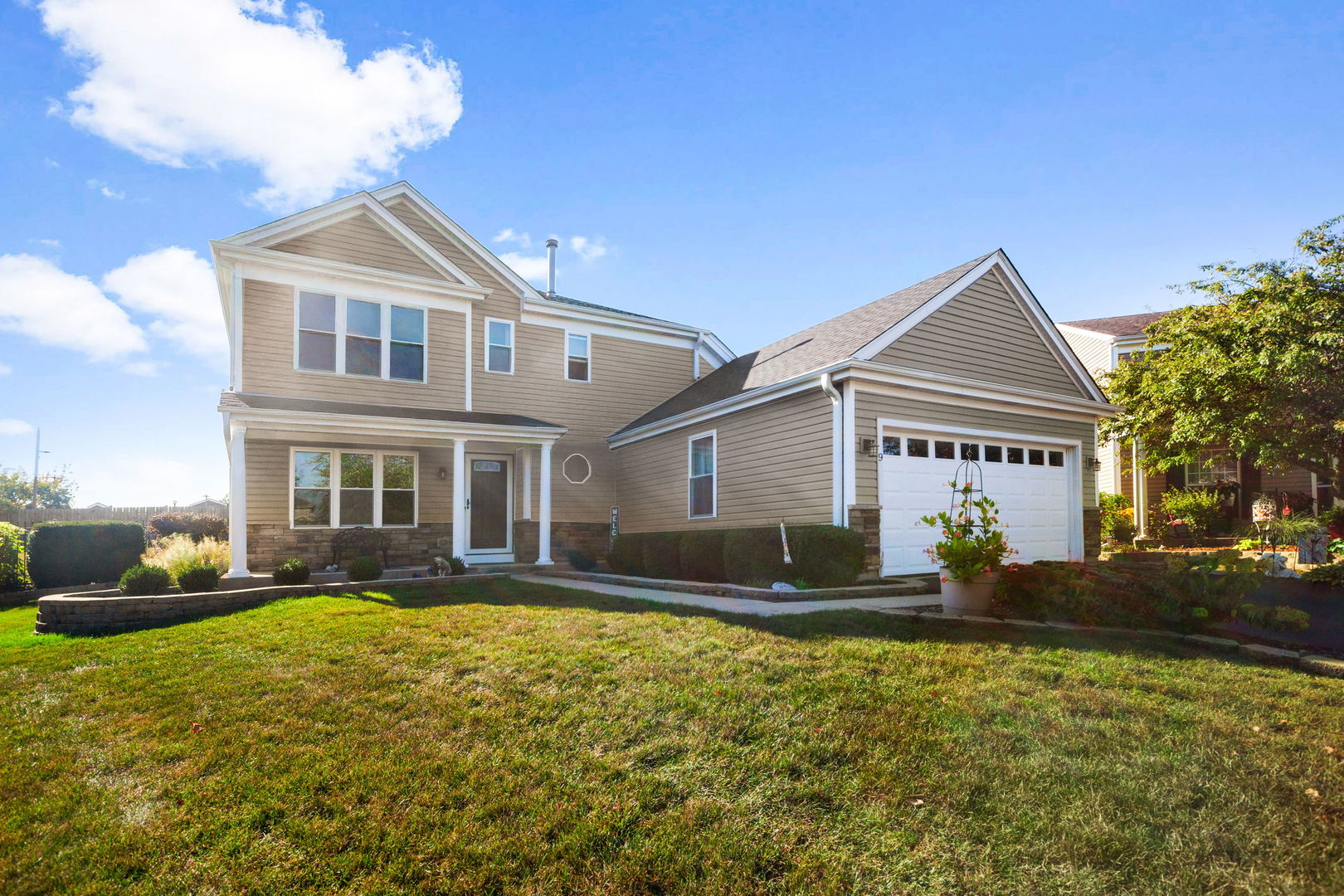 9 Arthur Court Streamwood, IL 60107 - Photo 1 of 21 a front view of a house with a yard