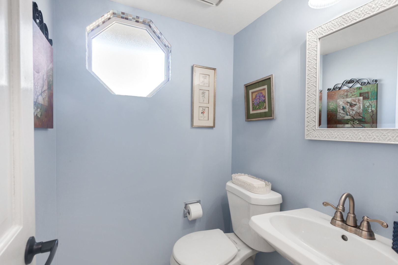 9 Arthur Court Streamwood, IL 60107 - Photo 14 of 21 a bathroom with a toilet and sink