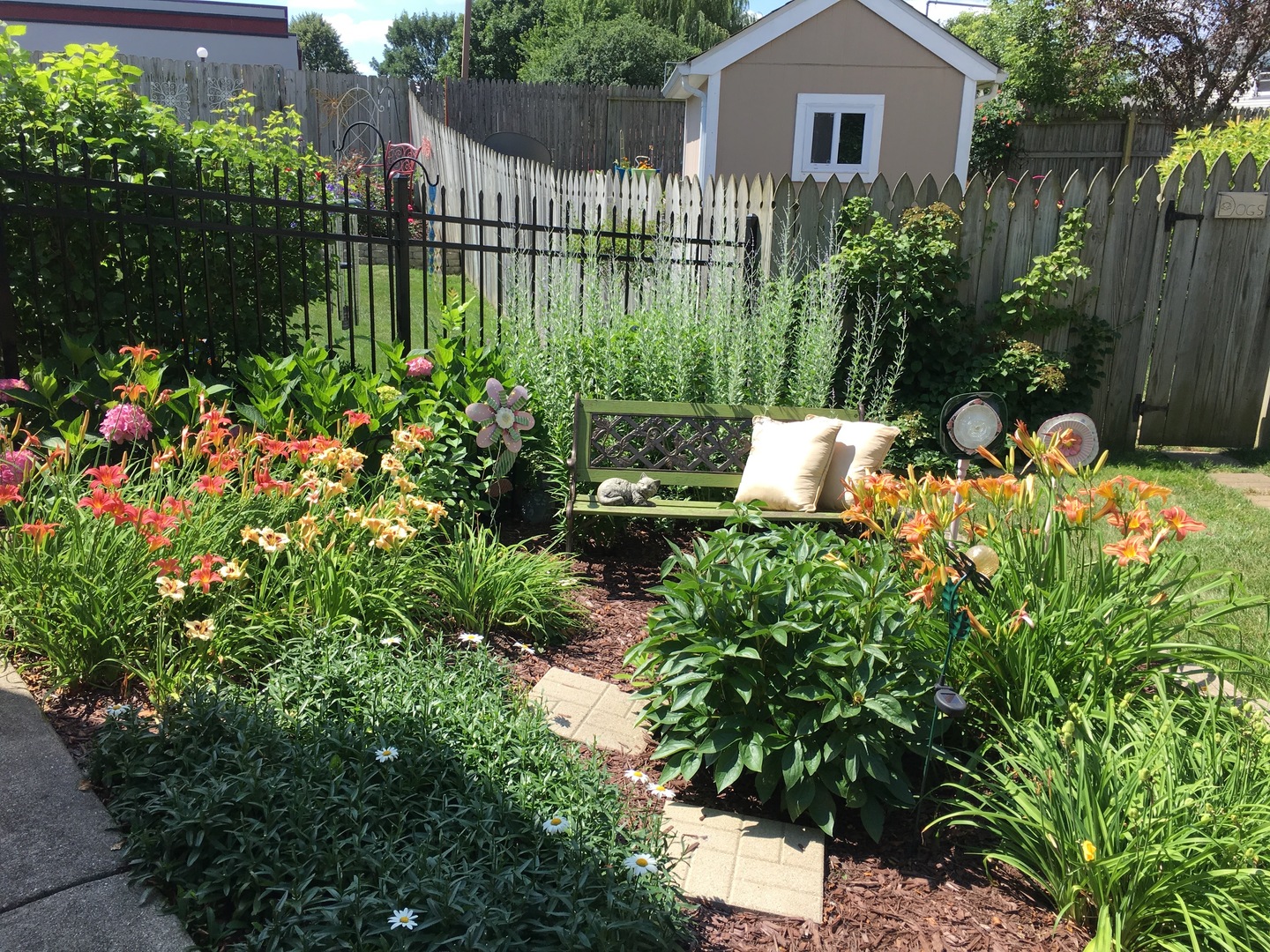 9 Arthur Court Streamwood, IL 60107 - Photo 20 of 21 a view of a house with a yard and garden