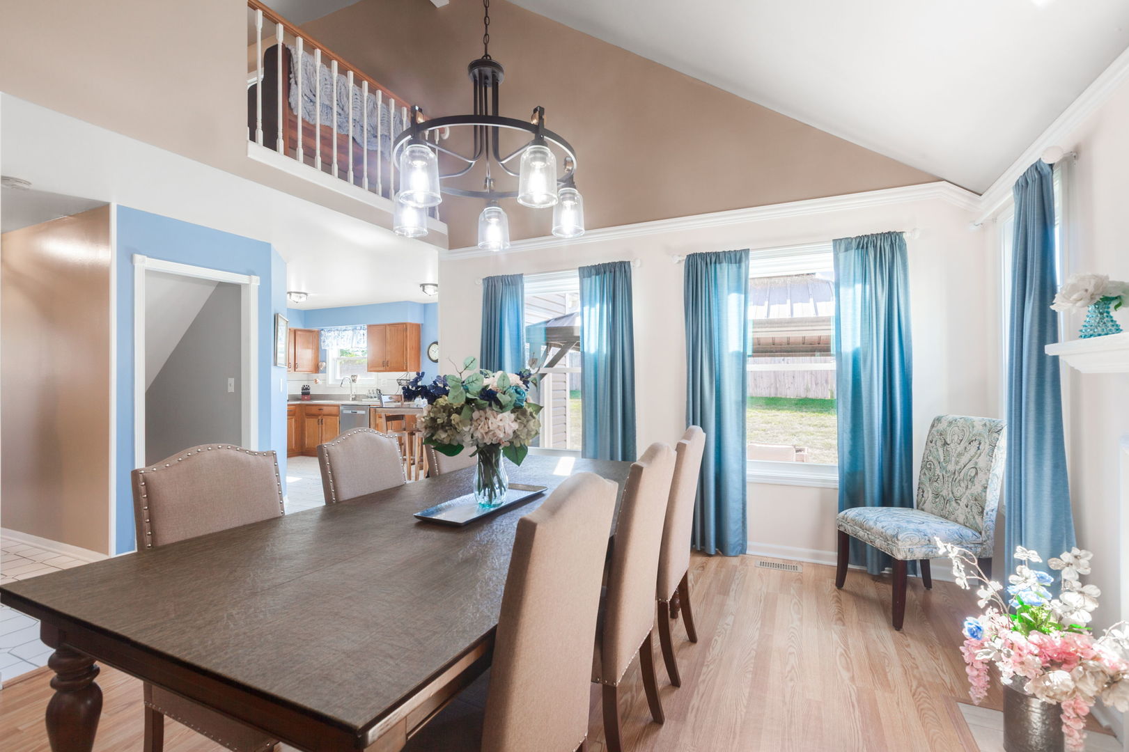 9 Arthur Court Streamwood, IL 60107 - Photo 6 of 21 a view of a dining room with furniture and a chandelier