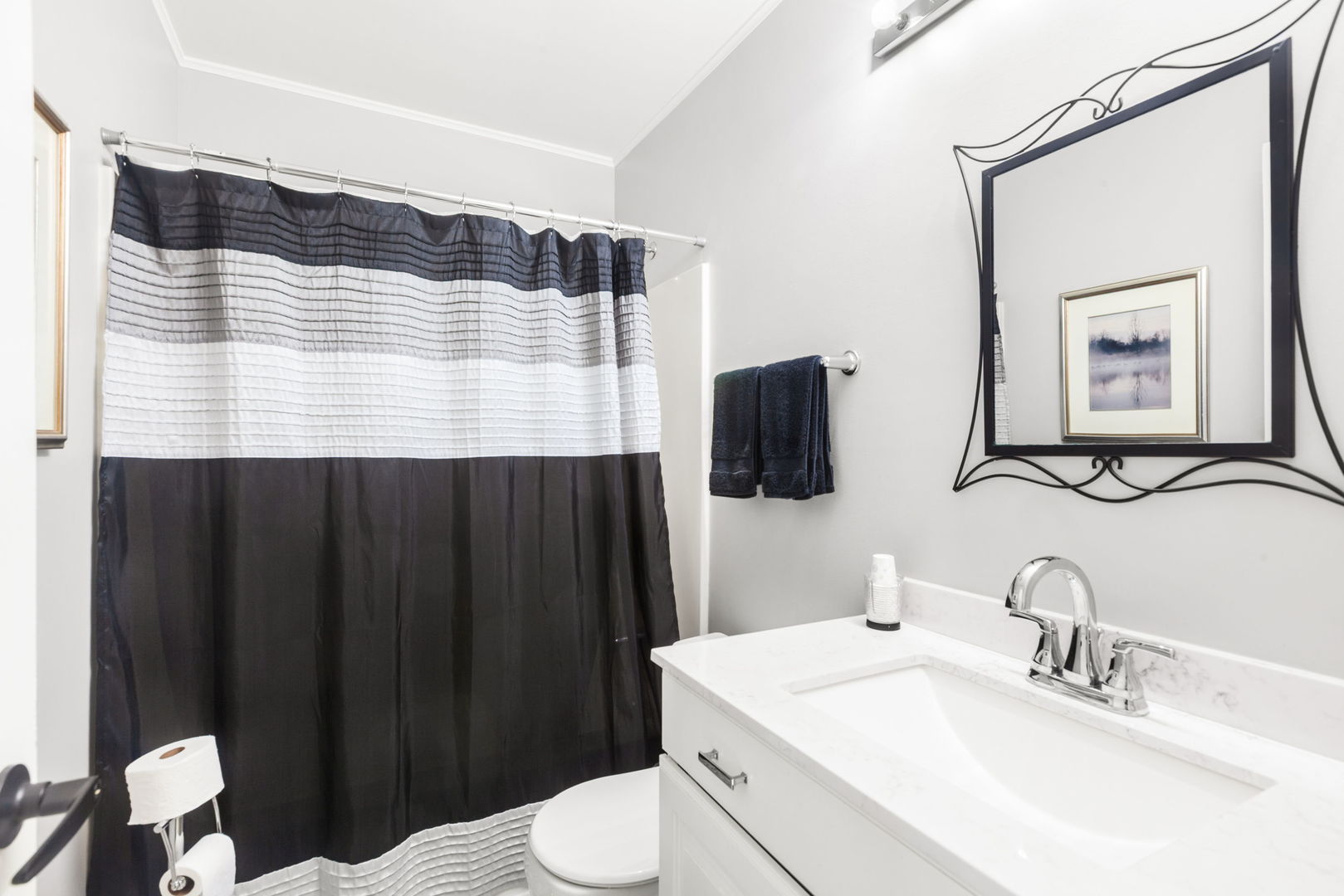 9 Arthur Court Streamwood, IL 60107 - Photo 10 of 21 a bathroom with a sink vanity and toilet