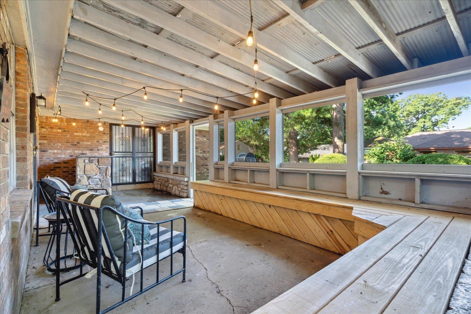 3093 Altruria Road Bartlett, TN 38134 - Photo 22 of 26 a view of a patio with a table chairs and a barbeque