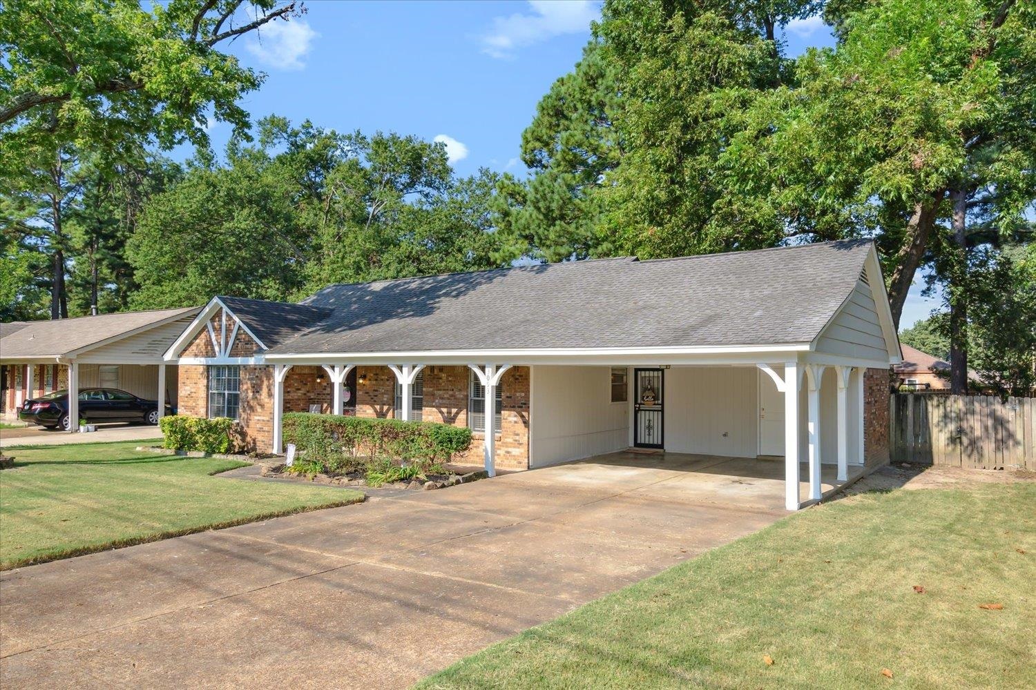 3093 Altruria Road Bartlett, TN 38134 - Photo 3 of 26 front view of a house with a yard