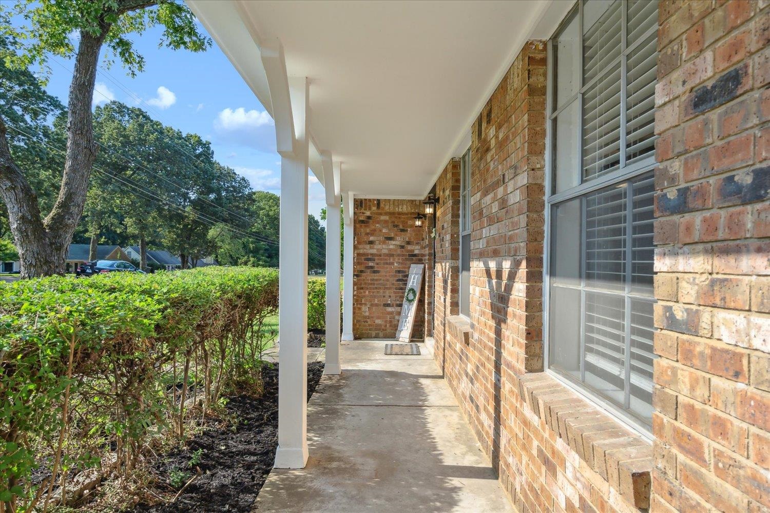 3093 Altruria Road Bartlett, TN 38134 - Photo 4 of 26 a view of a pathway both side of building