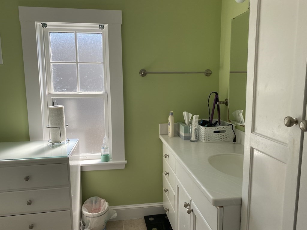 72 Everett Street Arlington, MA 02474 - Photo 21 of 25 a bathroom with a sink and a toilet