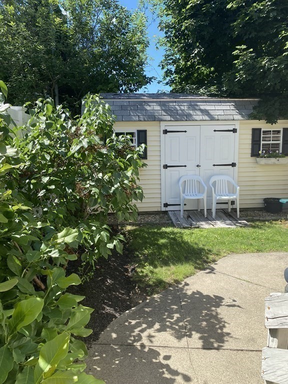 72 Everett Street Arlington, MA 02474 - Photo 24 of 25 a view of a house with a back yard