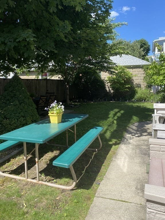 72 Everett Street Arlington, MA 02474 - Photo 5 of 25 a view of a backyard with sitting area