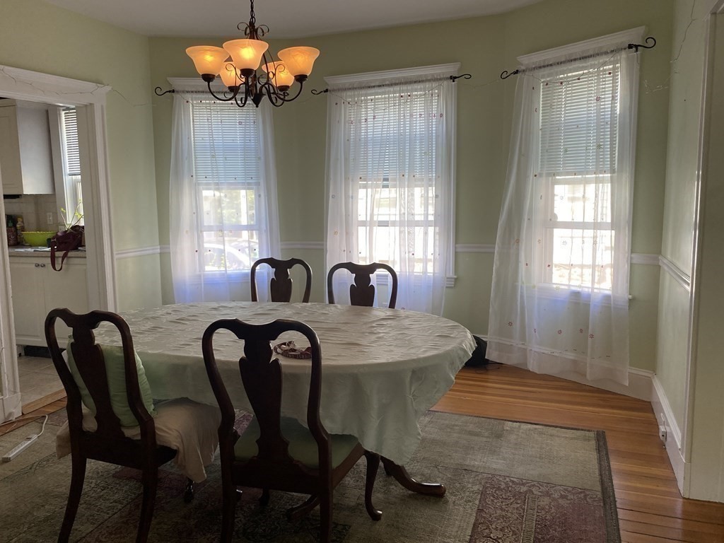 72 Everett Street Arlington, MA 02474 - Photo 9 of 25 a view of a dining room with furniture and window