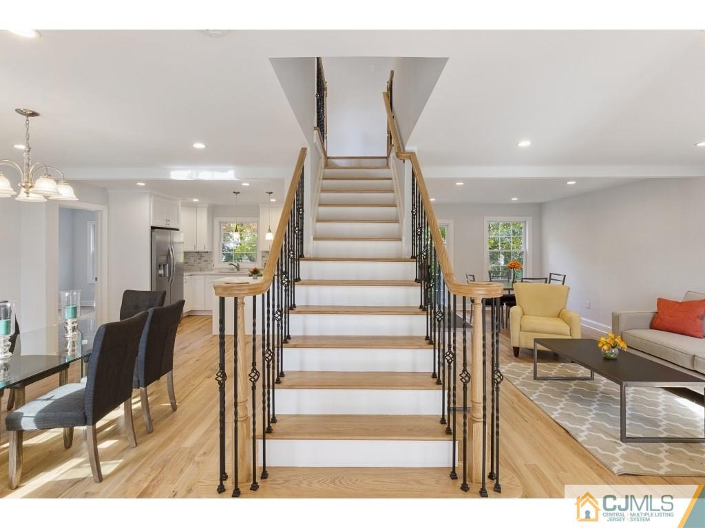 80 Lancaster Road Colonia, NJ 07067 - Photo 2 of 15 a view of entryway and hall with wooden floor