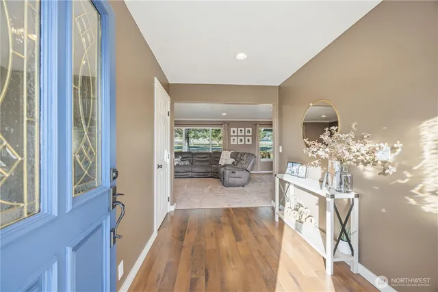 a very nice looking room with wooden floor