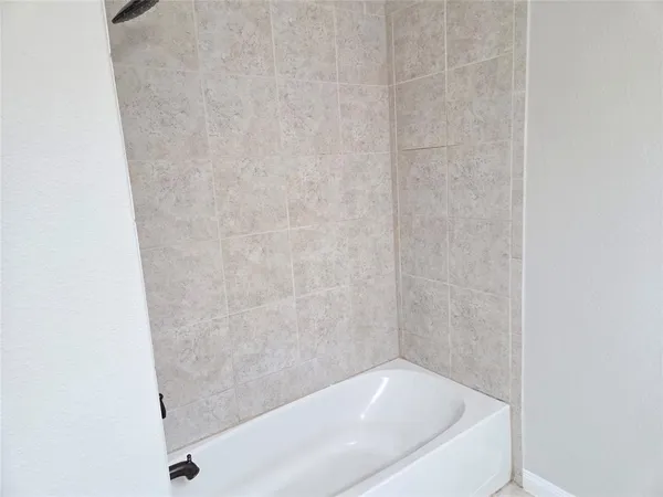 a bathroom with a bathtub