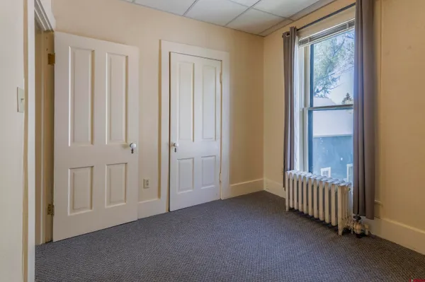 an empty room with windows