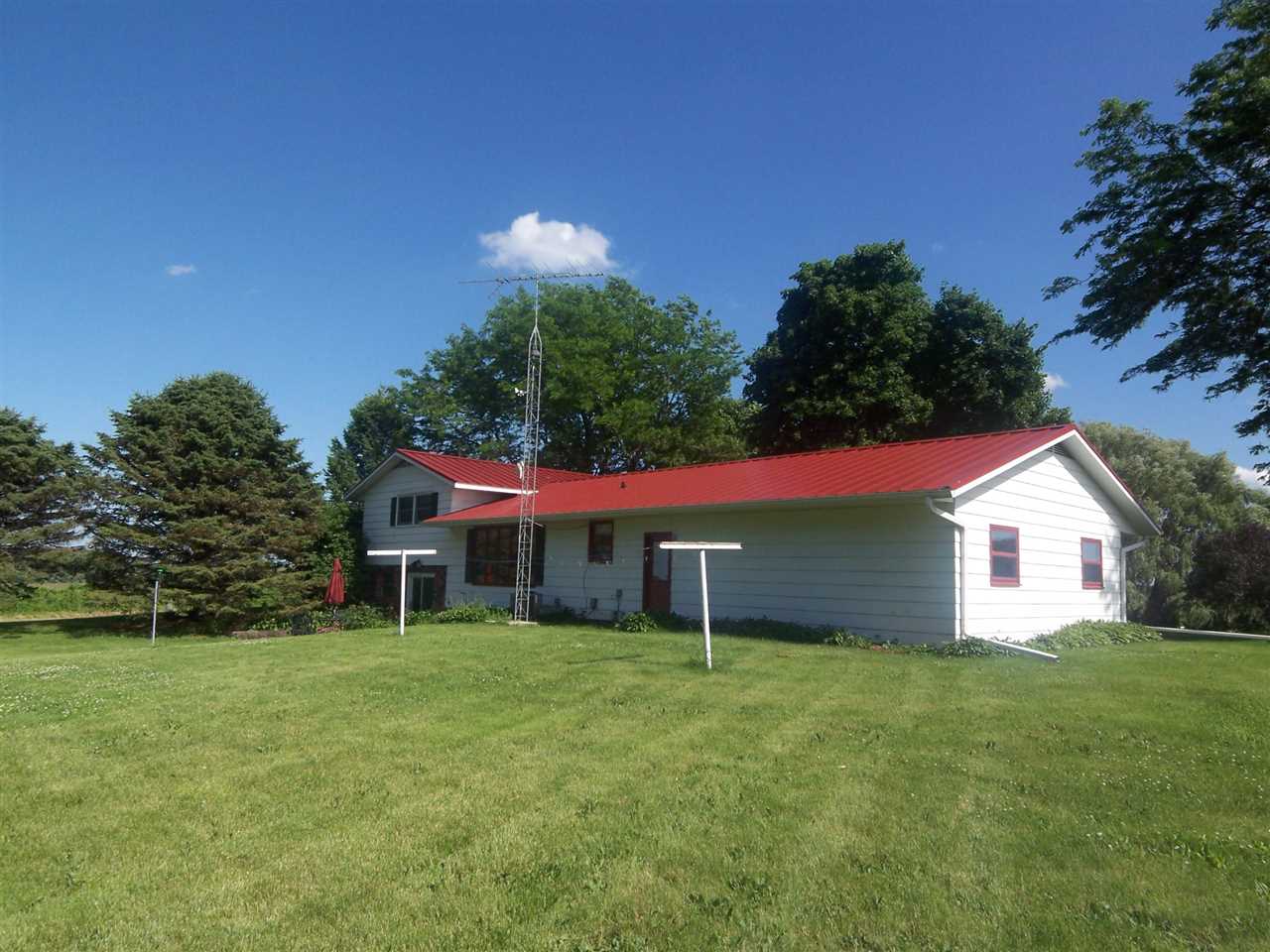 2666 South Rock City Road Ridott, IL 61067 - Photo 17 of 25 a view of house with outdoor space and garden