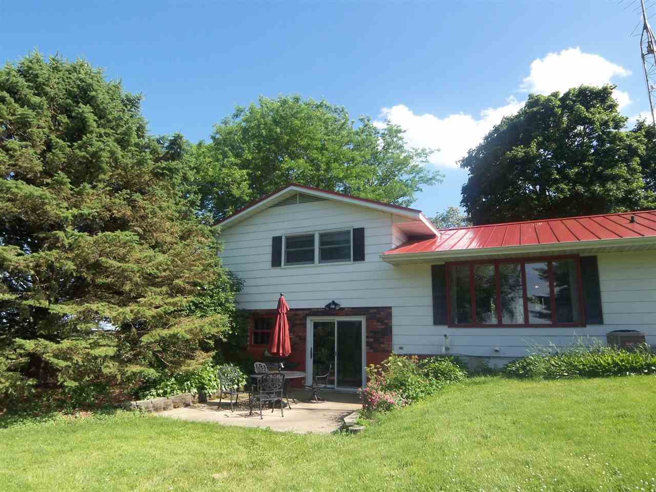 2666 South Rock City Road Ridott, IL 61067 - Photo 19 of 25 a view of a house with a yard