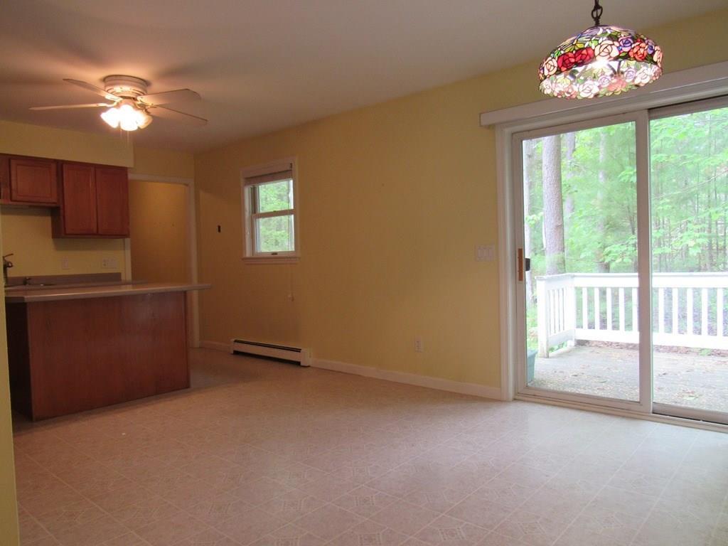 49 Pine Mountain Road Cape Neddick, ME 03902 - Photo 11 of 29 The kitchen has a glass sliding door...