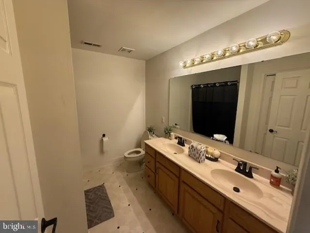 a view of a balcony with furniture