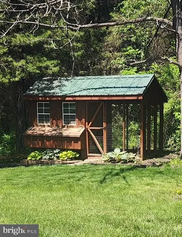 a view of a field with trees