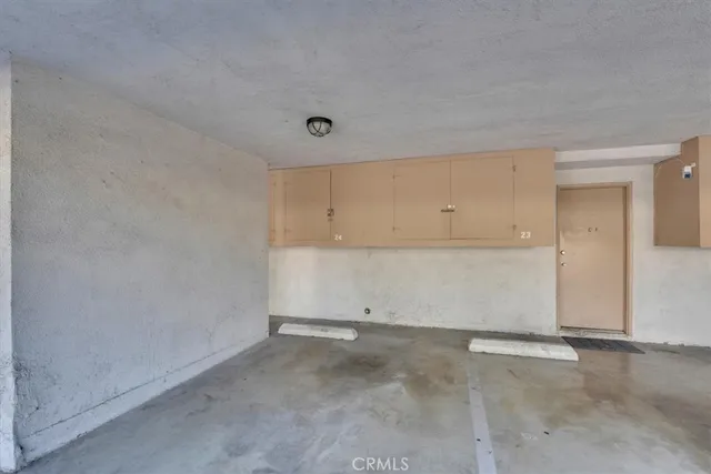 a view of swimming pool with outdoor seating and yard in the back