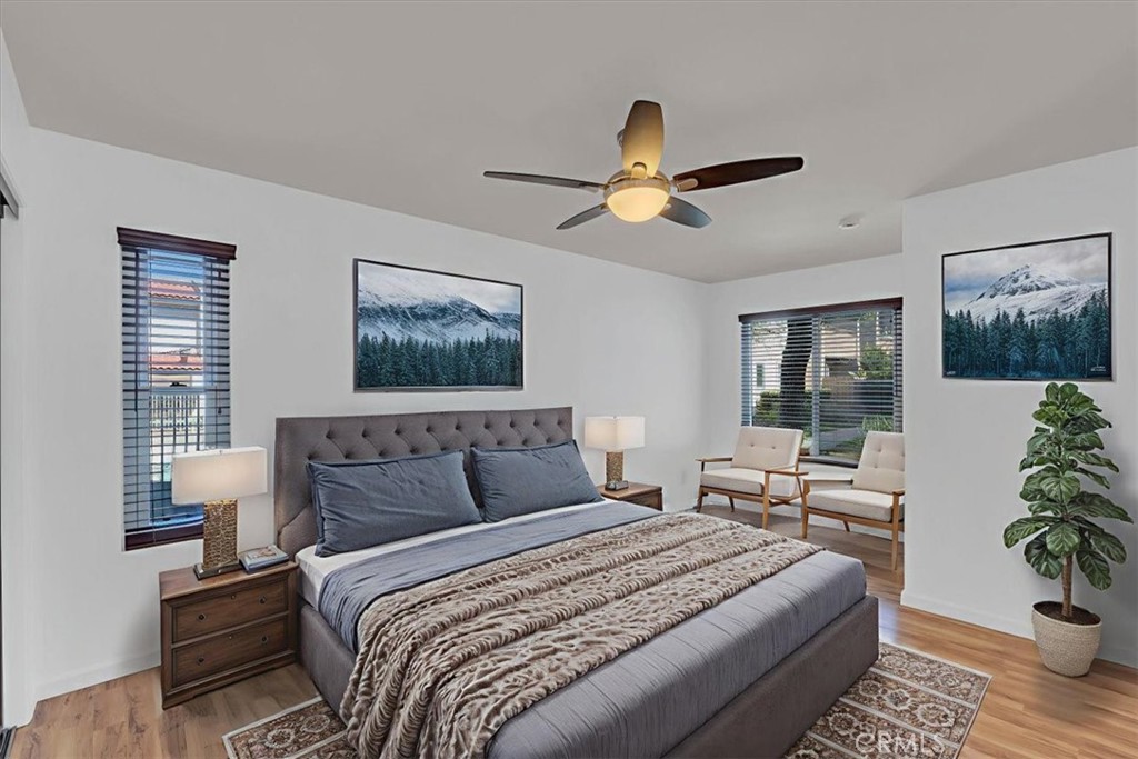 2521 West Sunflower Avenue, Unit H2 Santa Ana, CA 92704 - Photo 30 of 30 a bedroom with bed and windows