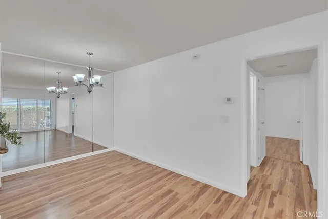 a view of a livingroom with wooden floor