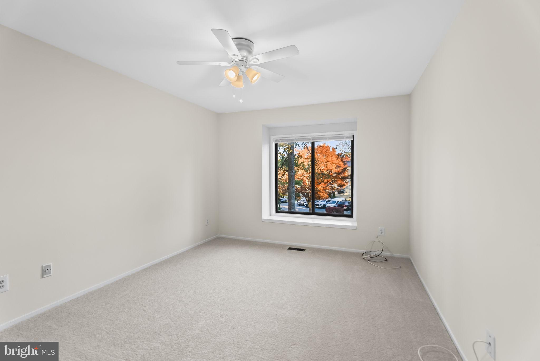 9413 Penshurst Court Gaithersburg, MD 20886 - Photo 18 of 32 an empty room with windows