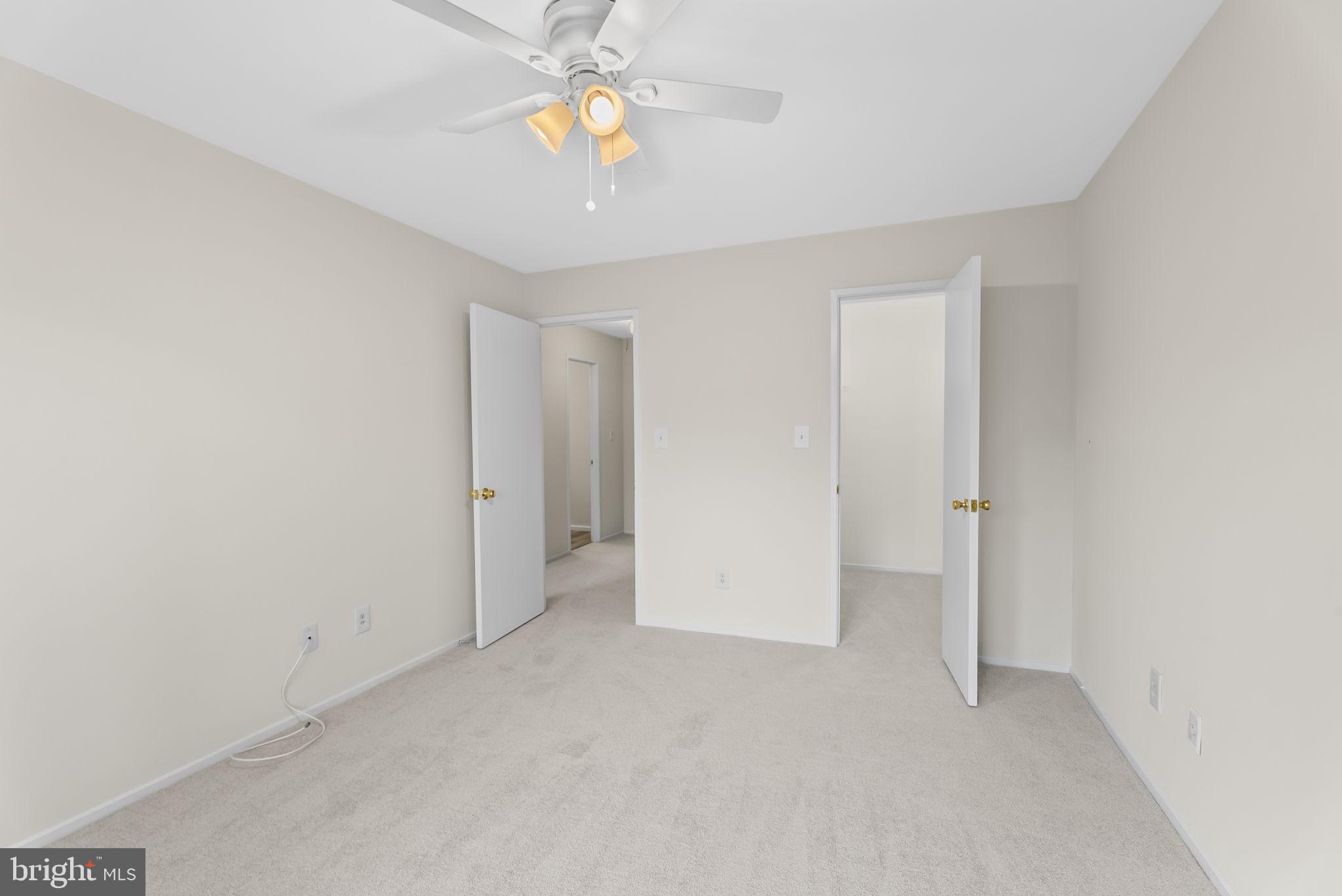 9413 Penshurst Court Gaithersburg, MD 20886 - Photo 19 of 32 wooden floor in an empty room