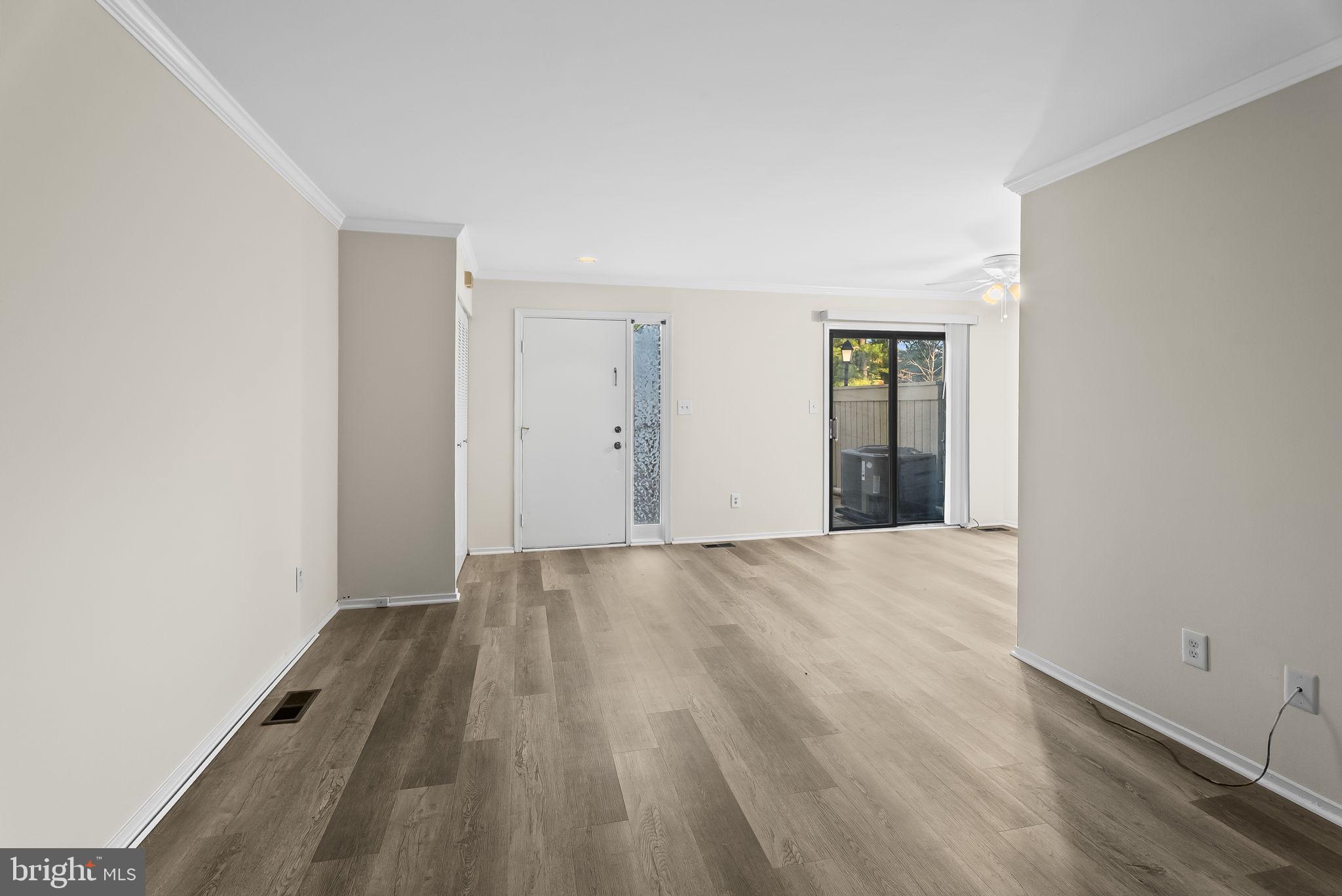 9413 Penshurst Court Gaithersburg, MD 20886 - Photo 8 of 32 wooden floor in an empty room