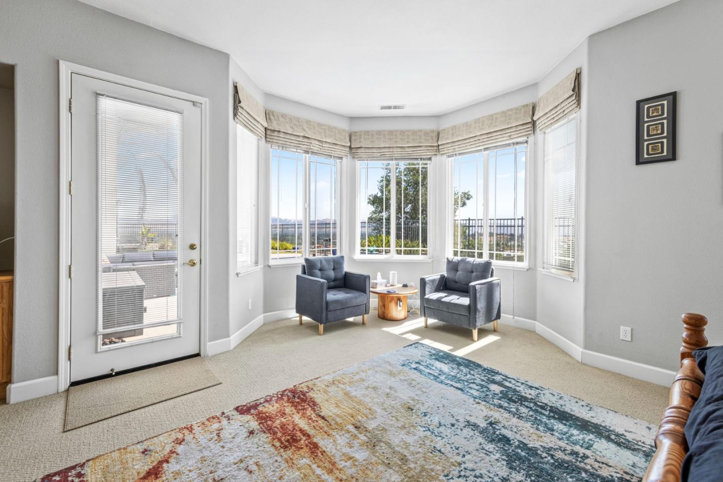 6850 Eagle Ridge Drive Gilroy, CA 95020 - Photo 15 of 51 a living room with furniture and large windows