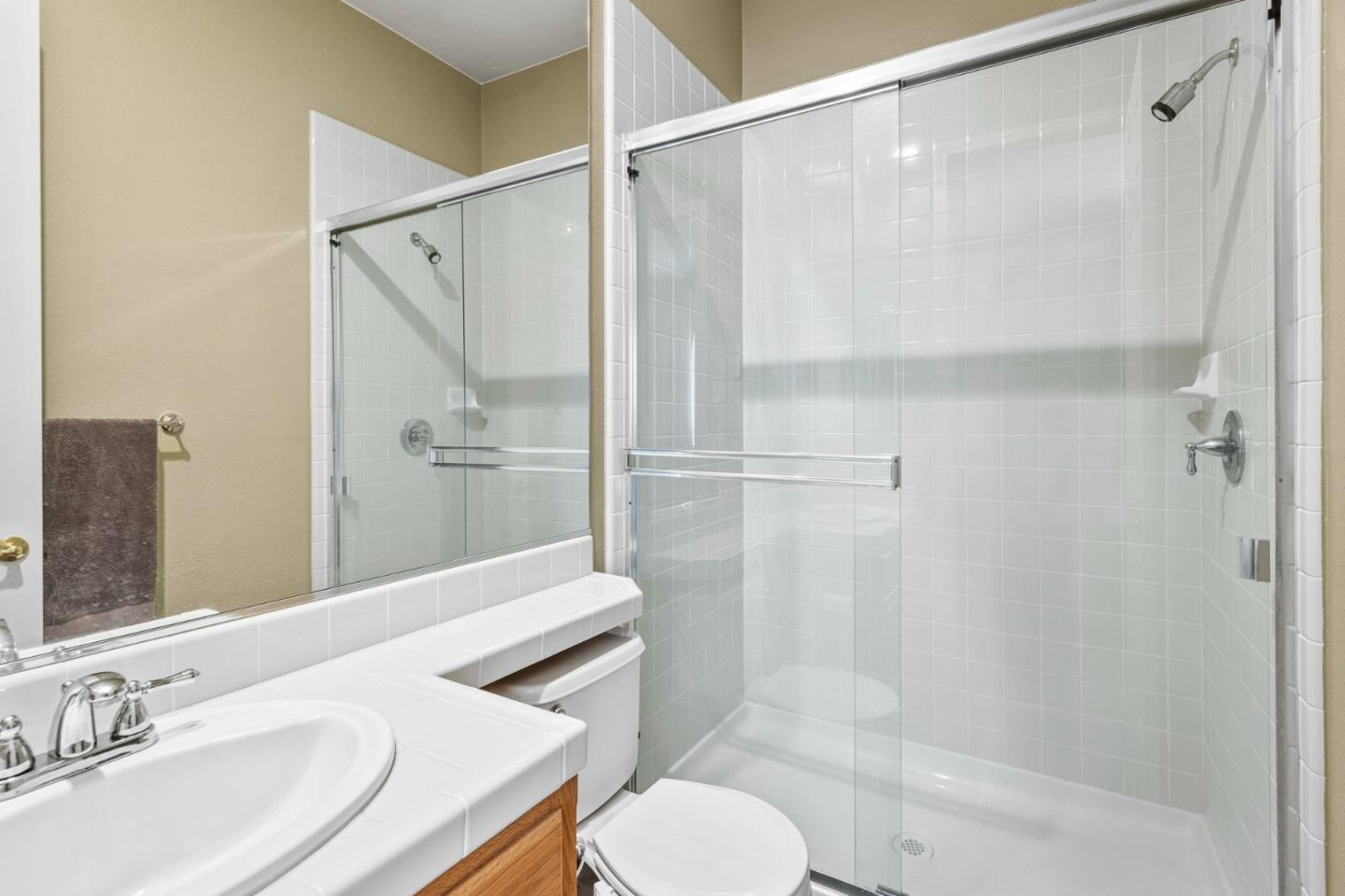 6850 Eagle Ridge Drive Gilroy, CA 95020 - Photo 21 of 51 a bathroom with a sink toilet and shower