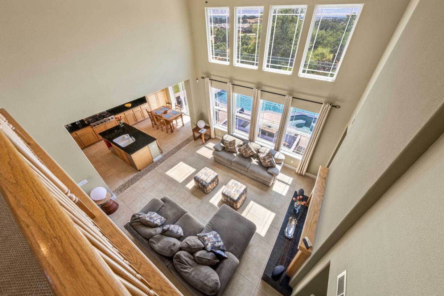 6850 Eagle Ridge Drive Gilroy, CA 95020 - Photo 22 of 51 a living room with furniture and floor to ceiling windows