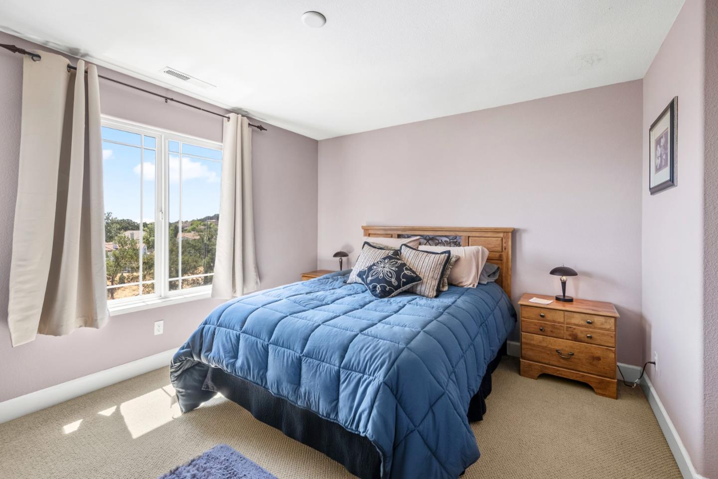 6850 Eagle Ridge Drive Gilroy, CA 95020 - Photo 26 of 51 a bedroom with a bed and a window